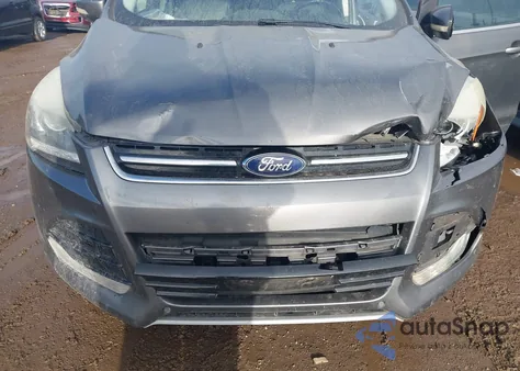 2014 Ford Escape Titanium z USA, uszkodzony, nr VIN 1FMCU9J99EUB58531